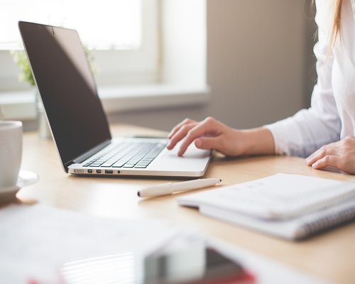 Professional working on a laptop at a home office in Mexico